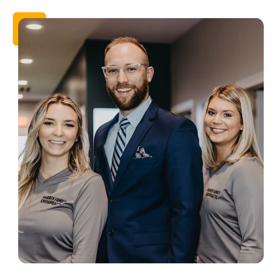 Chiropractic Coaching Ryan Warren With Staff